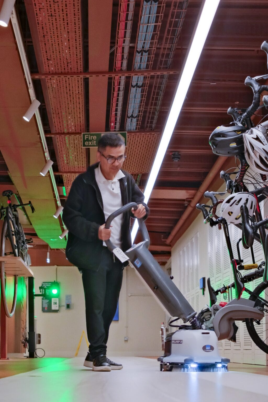 JPC by Samsic team member vacuuming in a London workplace