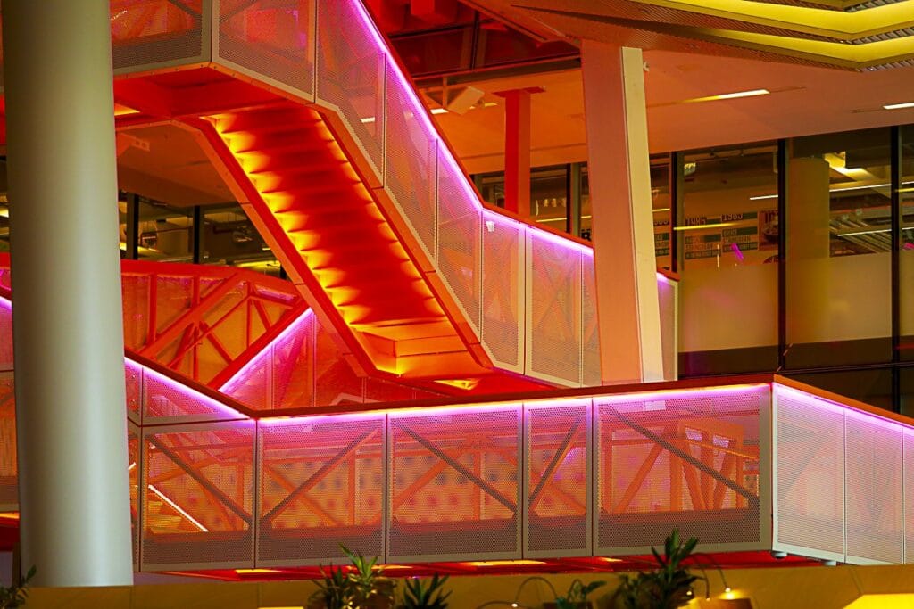 Lit staircase in a London hospitality venue